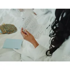 A wedding day is also about the quiet moments before the ceremony. Here, the bride reads a heartfelt letter, a personal and emotional start to her big day that we ensure is captured.