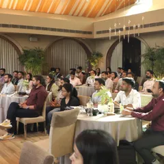 Attendees of the Team Computers workshop, seated in a classroom-style setup in our elegant indoor hall.