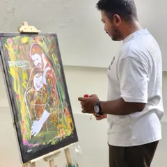 Taking a moment to step back and look at the painting's progress. This helps me ensure the composition and colors are perfectly balanced to reflect the atmosphere of the celebration.
