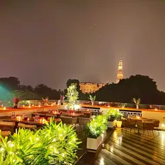 This is the view that defines our evenings. The Rooh terrace offers an unparalleled, surreal perspective of the Qutub Minar, creating a magical backdrop for any private dining or event.