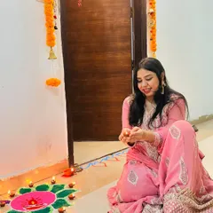 Lighting diyas and creating a colorful rangoli at the entrance of my home. These small traditional details bring so much warmth and festive spirit to the space during Diwali.