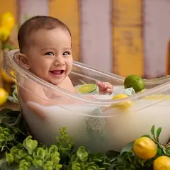 A lemon-themed milk bath is a bright and cheerful way to capture a milestone. The vibrant yellows and greens create a zesty, fun atmosphere.