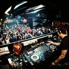 Behind the decks at Privee', reading the crowd and getting ready to drop the next track. It's all about that connection.