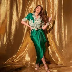 For the promotions of Netflix's 'Heeramandi', I was on the team that styled Sonakshi Sinha. This emerald green Anamika Khanna ensemble, with its intricate embroidery and modern draped silhouette, was chosen to reflect the grandeur and elegance of the series.
