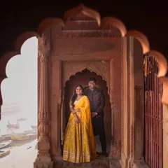 Framed by the heritage architecture of Varanasi's ghats, this couple's portrait feels both royal and intimate. I use the environment to create naturally beautiful compositions.