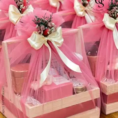 In every gift, there is a story waiting to be told. These hampers, wrapped in pink tulle and placed in wooden crates, are a beautiful example of how I craft heartfelt narratives for milestones, expressions of gratitude, or simply to show you care.