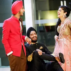 The happiness relations make are the best ones to capture. A candid shot of the groom sharing a laugh with his friends and family.