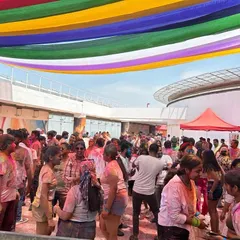 I’m comfortable playing for any crowd, big or small. This shot is from a massive Holi festival, where I managed the energy of a huge, vibrant audience under the open sky.