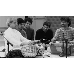 A cherished photograph with my Guruji, Pt. Yogesh Samsi ji, and my gurubhais. Learning together as part of a musical family is a true blessing.