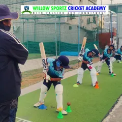 A group of young players learning the correct batting stance. We start with the absolute basics, ensuring every player has a solid foundation to build upon.