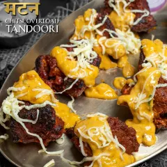 For the mutton lovers, our Mutton Cheese Overload Tandoori. Tender, spiced mutton pieces are grilled in the tandoor and then smothered in a creamy cheese sauce and extra shredded cheese.