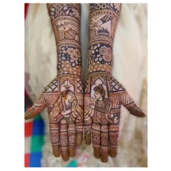 This design features a beautiful varmala ceremony portrait. The bride and groom are shown exchanging garlands, a pivotal moment captured forever in their mehendi.