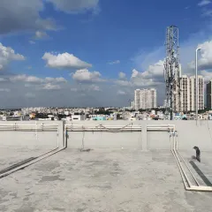 The same terrace from a different angle, showing the surrounding cityscape. My job is to create a green oasis right here in the middle of the urban environment.