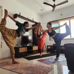 Three of us finding our balance and alignment together in Natarajasana (Dancer's Pose). Practicing with others brings a special kind of energy and joy.