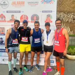The post-race group photo is always special. Here we are at the Sportives event, a group of friends bonded by the shared experience of the run, celebrating our medals and the effort we all put in.
