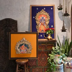 A set of two magnificent vintage Prabhavalis that a client sent to me for restoration and framing. The larger one features a custom-painted Vishnu, while the smaller one houses a Ganesha, both set against rich, hand-selected silk fabrics.