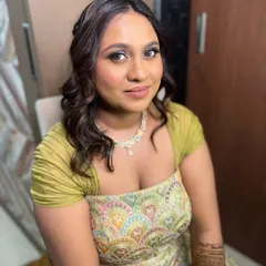A beautiful Mehendi look with a dramatic smokey eye, perfect for a festive celebration.