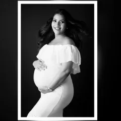 Black and white photography adds a classic, timeless feel to your maternity portraits. It strips away all distractions and focuses on your expression and the beautiful bond you already have with your baby.
