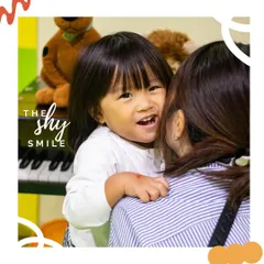 The shy smile. That sweet, peek-a-boo grin when they're feeling cozy and safe with mom.