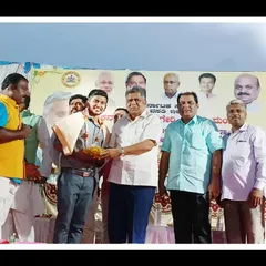 I felt very happy to be honored by our former Chief Minister, Shri Jagadish Shettar. This was during the 'Pradhan Mantri Awas Yojana' program, where I was invited to perform.