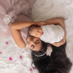An artistic overhead portrait capturing the tender bond between two sisters. I see these moments as poetry, freezing the quiet, beautiful connection that they will share for a lifetime.