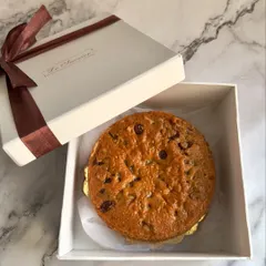 This giant choco-chip cookie cake is a fun and delicious centerpiece for any Diwali celebration. It comes beautifully packaged in a gift box, making it a unique and memorable present.