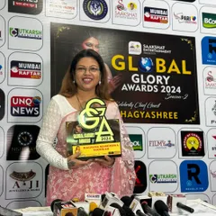 Proudly holding my Global Glory Award. This recognition fuels my passion to train the next generation of makeup artists.