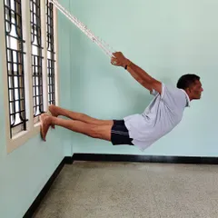 Rope Urdhva Mukha Shvanasana (Upward-Facing Dog). The ropes support the hips, allowing for a powerful opening of the chest and shoulders while the legs and spine are fully extended.