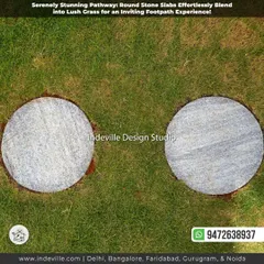 A detail shot of round granite stone slabs used as stepping stones in a lawn. This type of hardscaping creates a durable and visually appealing pathway that blends naturally with the grass.