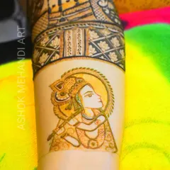 A close-up view of the Lord Krishna portrait from the previous design. You can see the fine lines and shading used to create a serene and divine expression.