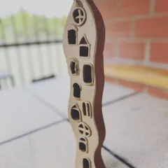 I love the excitement of working on odd shapes in hand-building. This wavy, carved lamp was a fun project that plays with light and shadow.