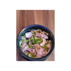 This is Eromba, a traditional Manipuri dish. It's made by mashing boiled vegetables with fermented fish and a lot of chilli. It has a very strong and unique flavour.