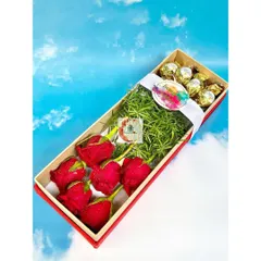 A classic gift of love for under ₹1000. This box contains beautiful red roses and a section of Ferrero Rocher chocolates, tied with a birthday ribbon.