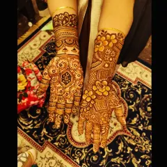 A little mehndi, a little magic, and a lot of love. This is a beautiful example of a party henna design, which is intricate but doesn't provide full coverage like a bridal design.