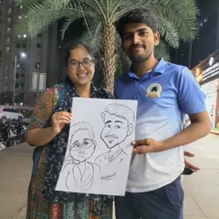 This couple was happy to pose with their joint caricature. These portraits are especially popular at weddings and anniversary parties.