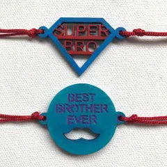 For the superhero in your life. This set includes 'Super Bro' and 'Best Brother Ever' rakhis, hand-painted in bold colours on MDF cutouts.