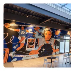 A full view of the powerful mural in our academy, designed to inspire our players with images of Indian basketball heroes.
