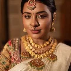 A close-up of the makeup for this festive look. The eyes are defined with a classic liner, and the skin has a beautiful, natural glow.