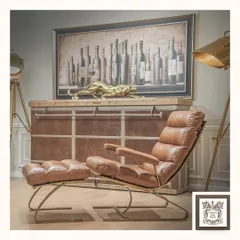 This leather lounge chair and ottoman set is designed for pure relaxation. Its ergonomic form and plush upholstery offer a luxurious escape, proving that comfortable seating can also be exceptionally stylish.
