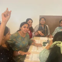 Teachers collaborating and problem-solving together during a training session. I believe professional development should honor the wisdom in the room and build a community of learners who support one another.