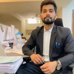 At my desk, surrounded by case files. The work of an advocate extends far beyond the courtroom. It involves meticulous review of documents, drafting pleadings, and preparing strategies to ensure every client receives the strongest possible representation.