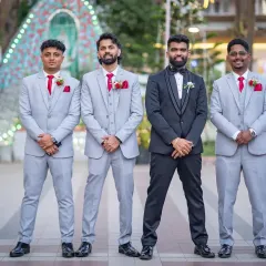 The groom and his groomsmen looking sharp. Capturing the camaraderie and fun of the wedding party is just as important as the couple's portraits.