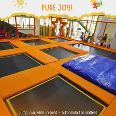 This is our giant trampoline park, a space dedicated to jumping, bouncing, and pure joy. It's a safe, padded area where kids can burn off energy and have a fantastic time.