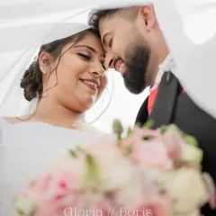 An intimate moment from a Christian wedding, captured under the bride's veil. I focus on creating soft, romantic portraits that highlight the couple's connection, using natural light to create a timeless feel.