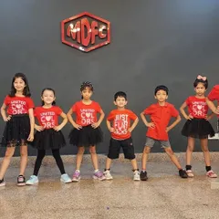 The full summer camp crew striking a pose. I focus on teamwork and coordination, so group performances like this are a big part of the camp experience.