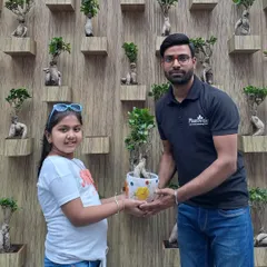A Plantwale team member engaging with the community during a greening event at Pacific Mall. We enjoy sharing our passion for plants and educating others on the benefits of going green.
