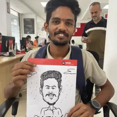 A live caricature session for the staff and customers at a Kotak Mahindra Bank branch in Dombivali. It's a great way to foster community and fun in a professional environment.