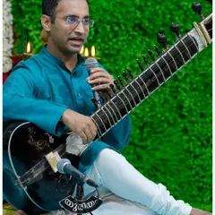 During a Q&A segment at a concert in Kerala. I always encourage questions from the audience as it transforms a performance into a shared experience, allowing for a deeper appreciation of the art form.