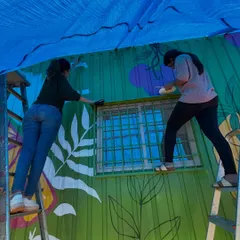 This was one of my toughest murals. We were dealing with an uneven surface, rain, and a corrugated wall. I share how to prepare for and manage difficult on-site challenges to ensure the project gets completed.