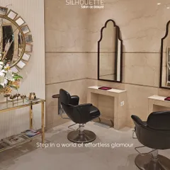 Step into a world of effortless glamour. Our salon's design, featuring plush seating, elegant mirrors, and warm marble tones, is crafted to make you feel comfortable and pampered from the moment you arrive.